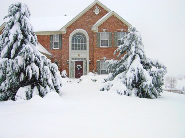 Exterior home with blanket of snow