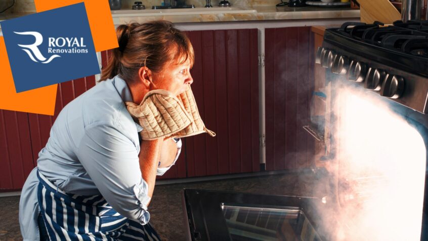 Woman in a kitchen looking into her oven as smoke and bright light from fire escapes from the open oven door.