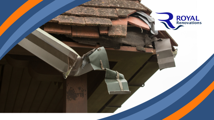 A picture of a residential roof. The gutter is twisted and damaged beyond repair.